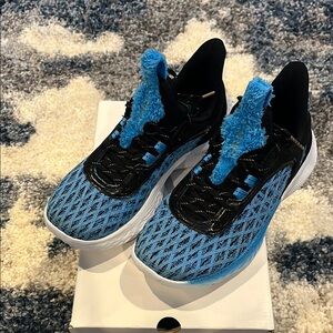 Steph Curry UA Sesame Street Cookie Monster collab